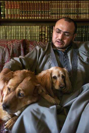 Dr. Khaled Abou El Fadl with his rescued dogs.